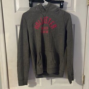 Hollister Charcoal Hoodie with Vibrant Pink Text